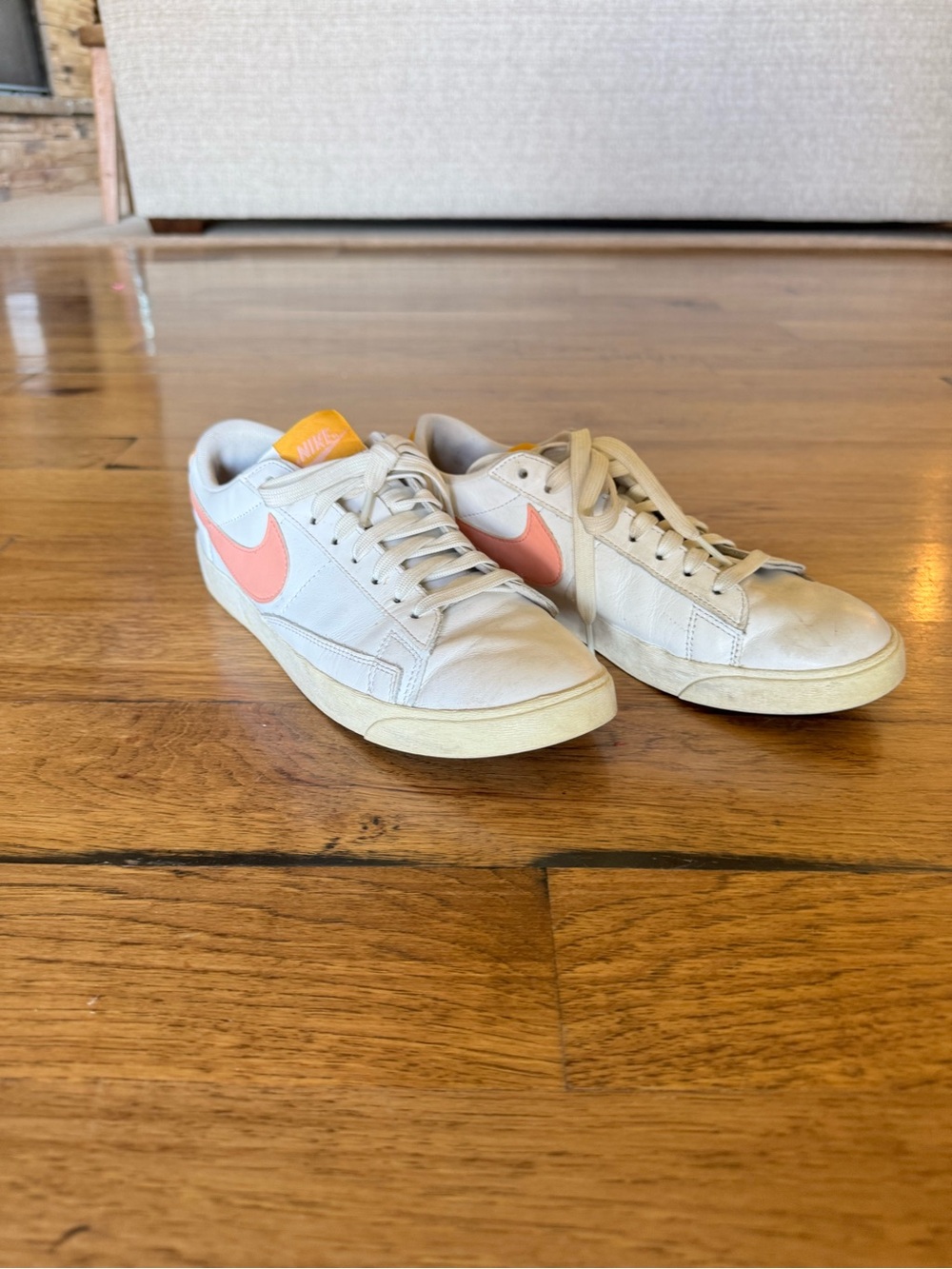 Nike Women’s White Sneakers with Coral Swoosh